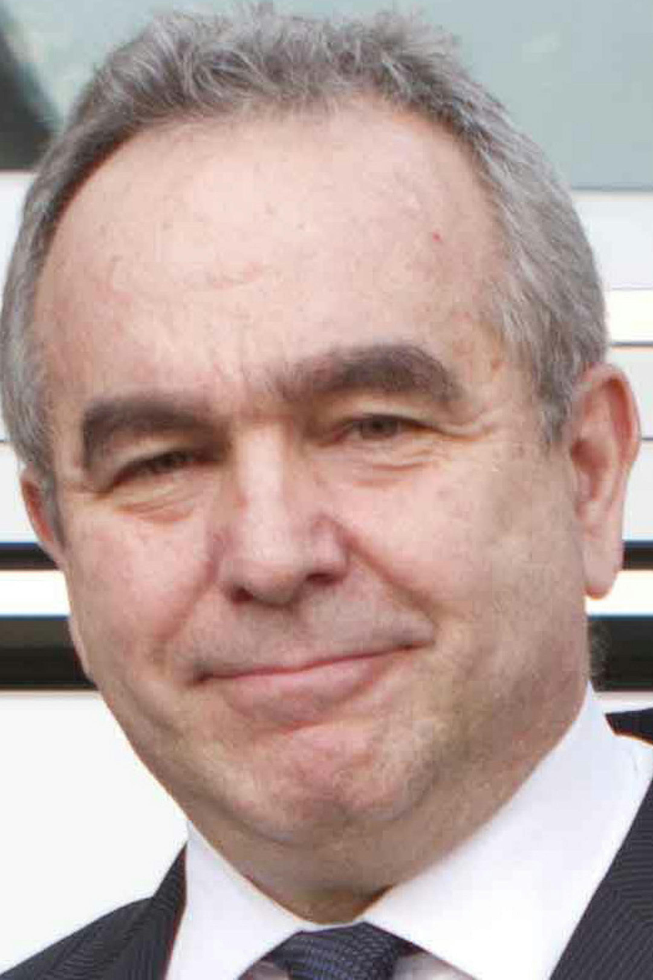 In this photo released by the US Embassy Beijing Press Office, blind lawyer Chen Guangcheng, front left, holds hands with U.S. Assistant Secretary of State for East Asia and Pacific Affairs Kurt Campbell, as U.S. Ambassador to China Gary Locke, back center, looks on, before leaving the U.S. Embassy for a hospital in Beijing Wednesday May 2, 2012. (AP Photo/US Embassy Beijing Press Office, HO) ORG XMIT: MIN2013040417070813