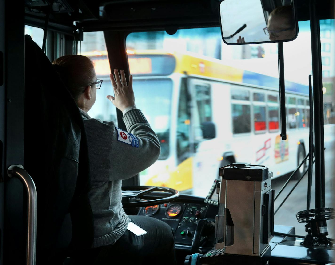 Metro Bus driver Deb Sievers heads along her route in downtown Minneapolis and Uptown Thursday, Dec. 14, 2017, in Minneapolis, MN. Sievers, who has driven a Metro bus for 13 plus years, has been spit on twice and punched in the face, requiring medical service, as well as being threatened with her life. She is also a peer counselor for fellow Metro Bus drivers who have been assaulted. "I have seen a lot," Sievers said.] DAVID JOLES &#xef; david.joles@startribune.com Continued assaults on local bu