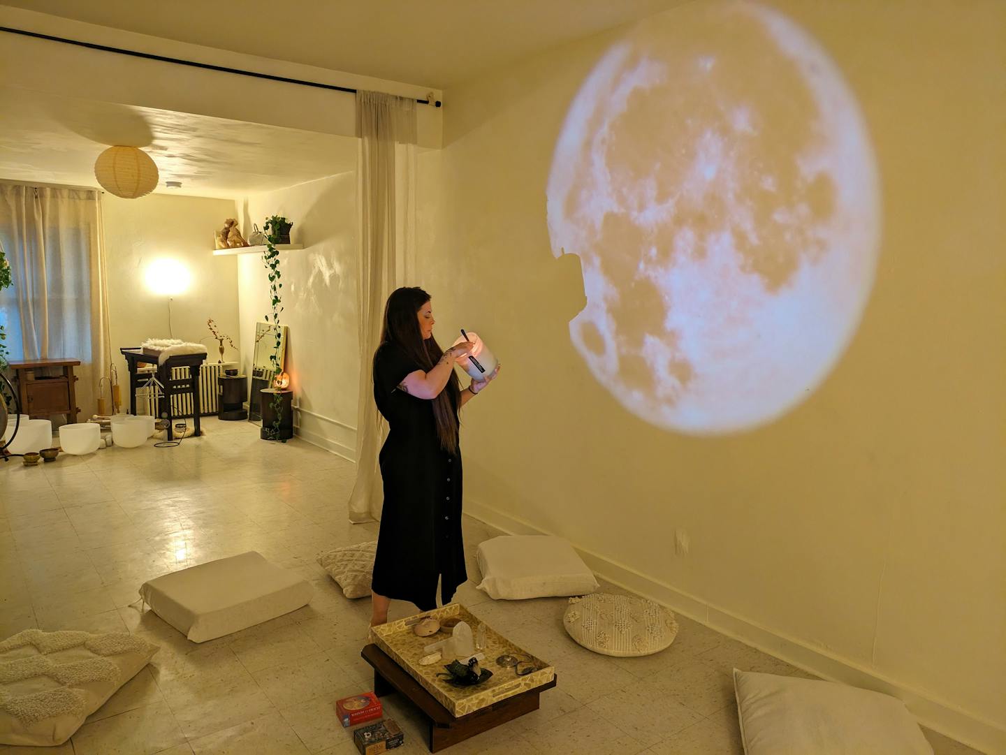 Hayl Lindma prepares to host a full moon medicine circle at Haus of Ritual on Lyndale Avenue in Minneapolis.
