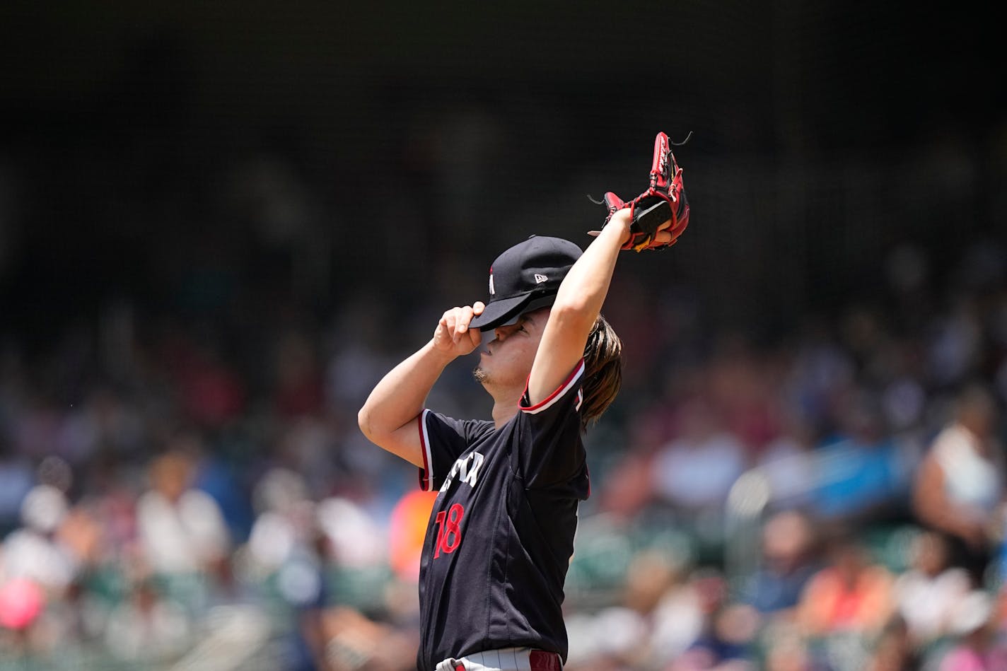 Minnesota Twins starting pitcher Kenta Maeda (18) plays a baseball game against the Atlanta Braves, Wednesday, June 28, 2023, in Atlanta. (AP Photo/Brynn Anderson)