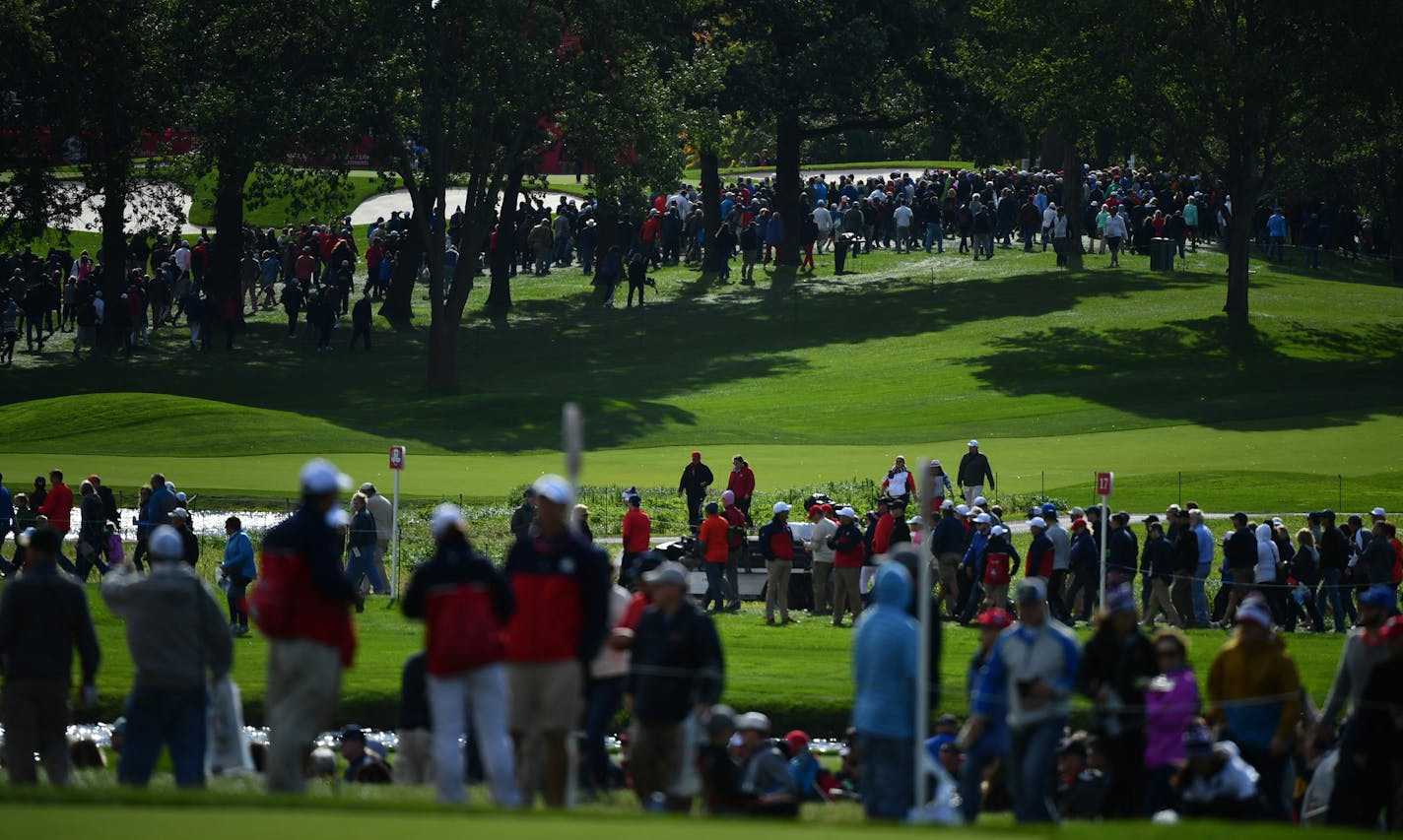 Fans navigated the course at Hazeltine National Golf Club while watching Team USA and Team Europe practice Tuesday. ] (AARON LAVINSKY/STAR TRIBUNE) aaron.lavinsky@startribune.com Team USA and Team Europe practiced for the Ryder Cup at Hazeltine National Golf Club on Tuesday, Sept. 27, 2016 in Chaska, Minn.