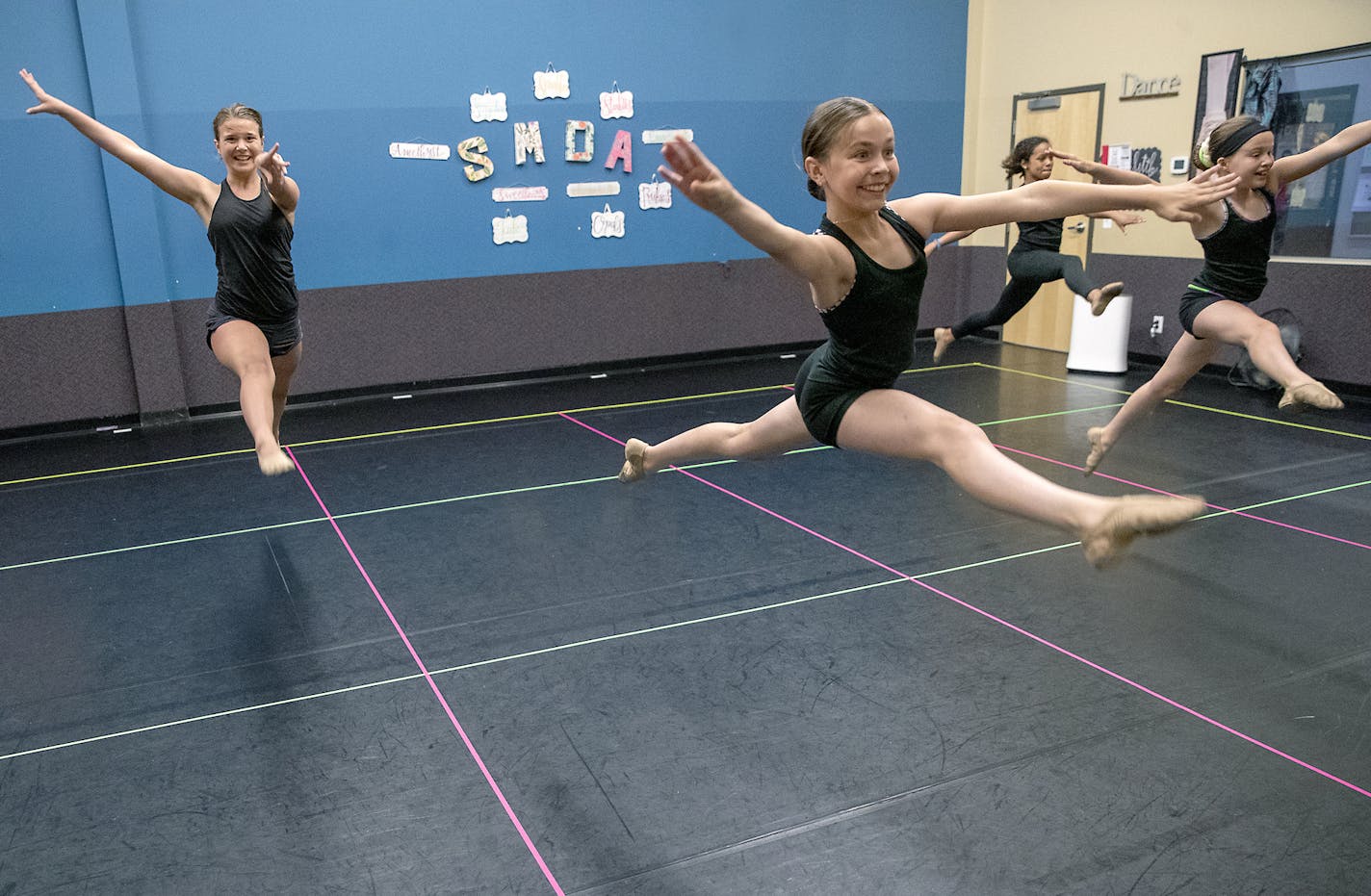 The floors of Jeanne Johnson's South Metro Dance Academy are now lined with colored lines to separate dancers to allow for social distancing during her classes, Monday, June 29, 2020 in Lakeville, MN. ] ELIZABETH FLORES • liz.flores@startribune.com