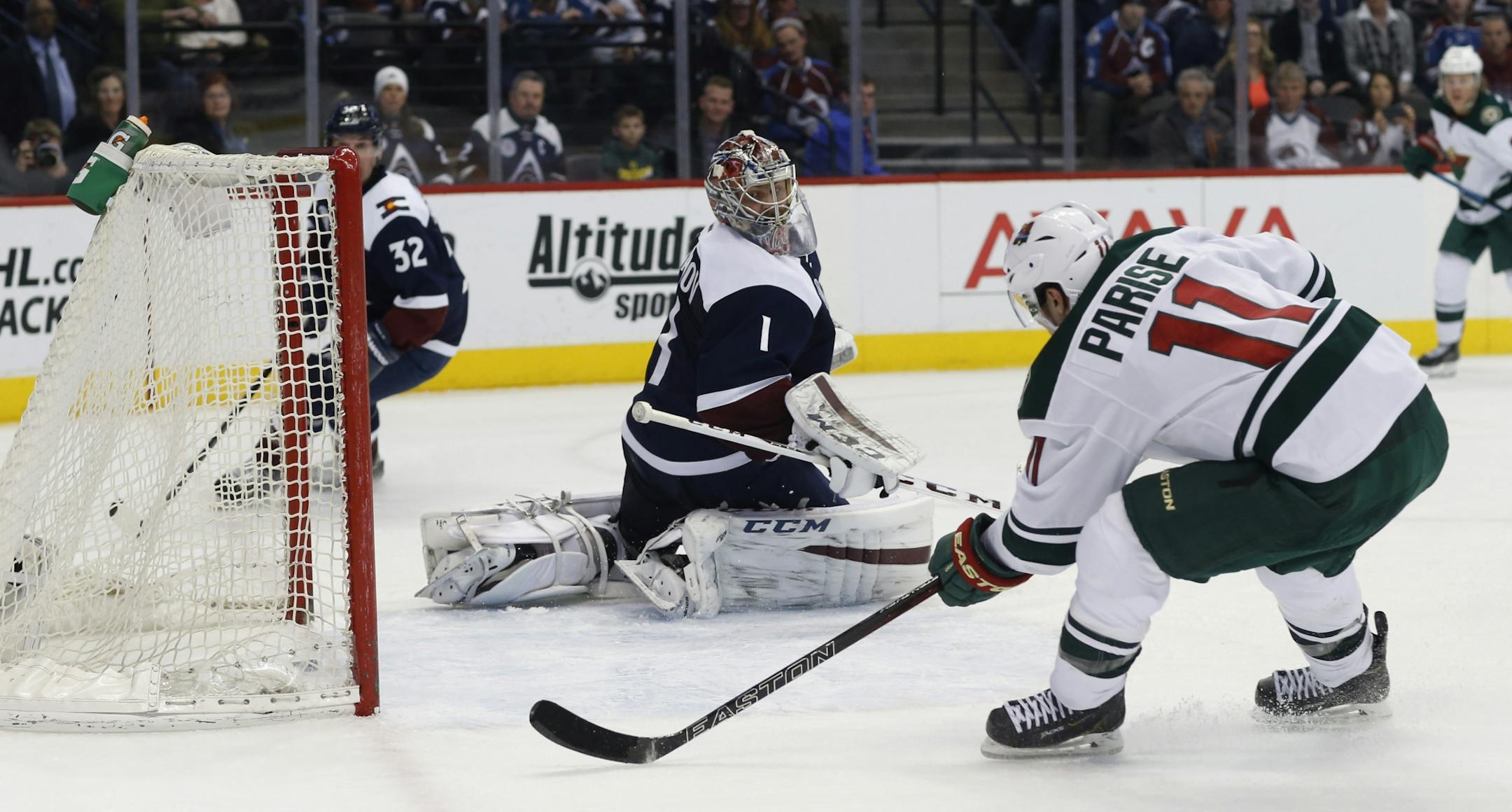 Wild left winger Zach Parise (11) scored past Avalanche goalie Semyon Varlamov in the second period Saturday in Denver.