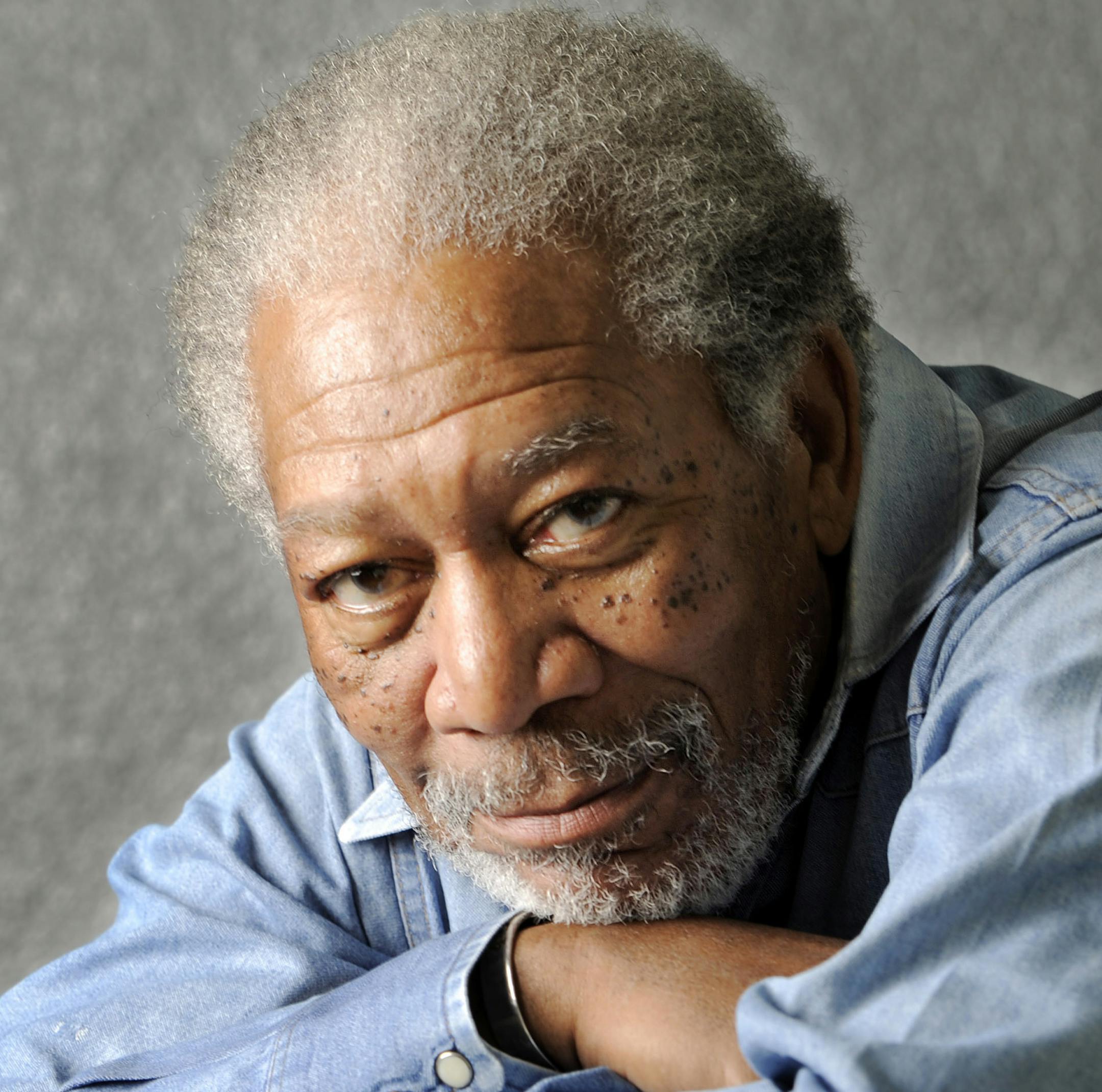 FILE - In this April 25, 2011 file photo, actor Morgan Freeman poses for a portrait in Los Angeles. Freeman will receive the Ceceil B. DeMille Award for lifetime achievement at the Golden Globes ceremony on Jan. 15, 2011. (AP Photo/Chris Pizzello, file) ORG XMIT: MIN2013021414512182