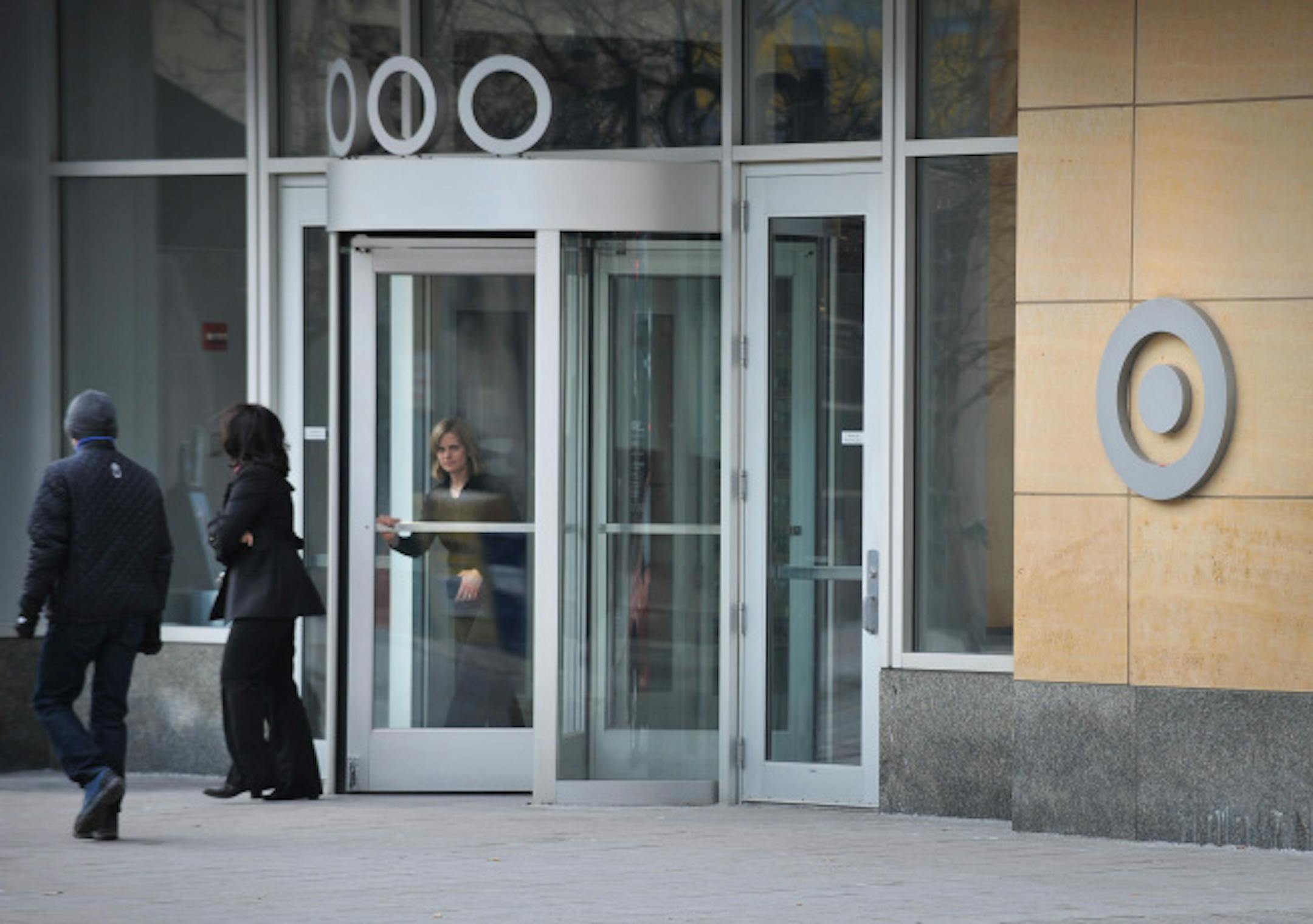 Unidentified workers exited in the lobby of Target Headquarters on Nicollet Mall Tuesday afternoon. There were reports of layoffs at Target on Tuesday.