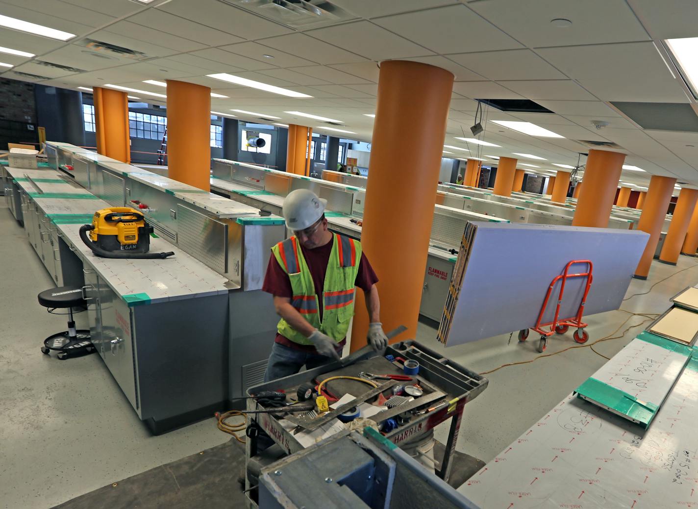 Workstations at the Liquid Lab area of the Valspar Applied Science and Technology Center building are close to being finished. Photographed on 1/3/14. The recovery in manufacturing has spawned many building projects across the state. The state reports 110 projects underway or recently completed, including 3M, Toro, DataCard, ProtoLabs and Valspar. Valspar is converting its old headquarters into a large research center with state of the art labs. The project (estimated to be nearly $30 million) i