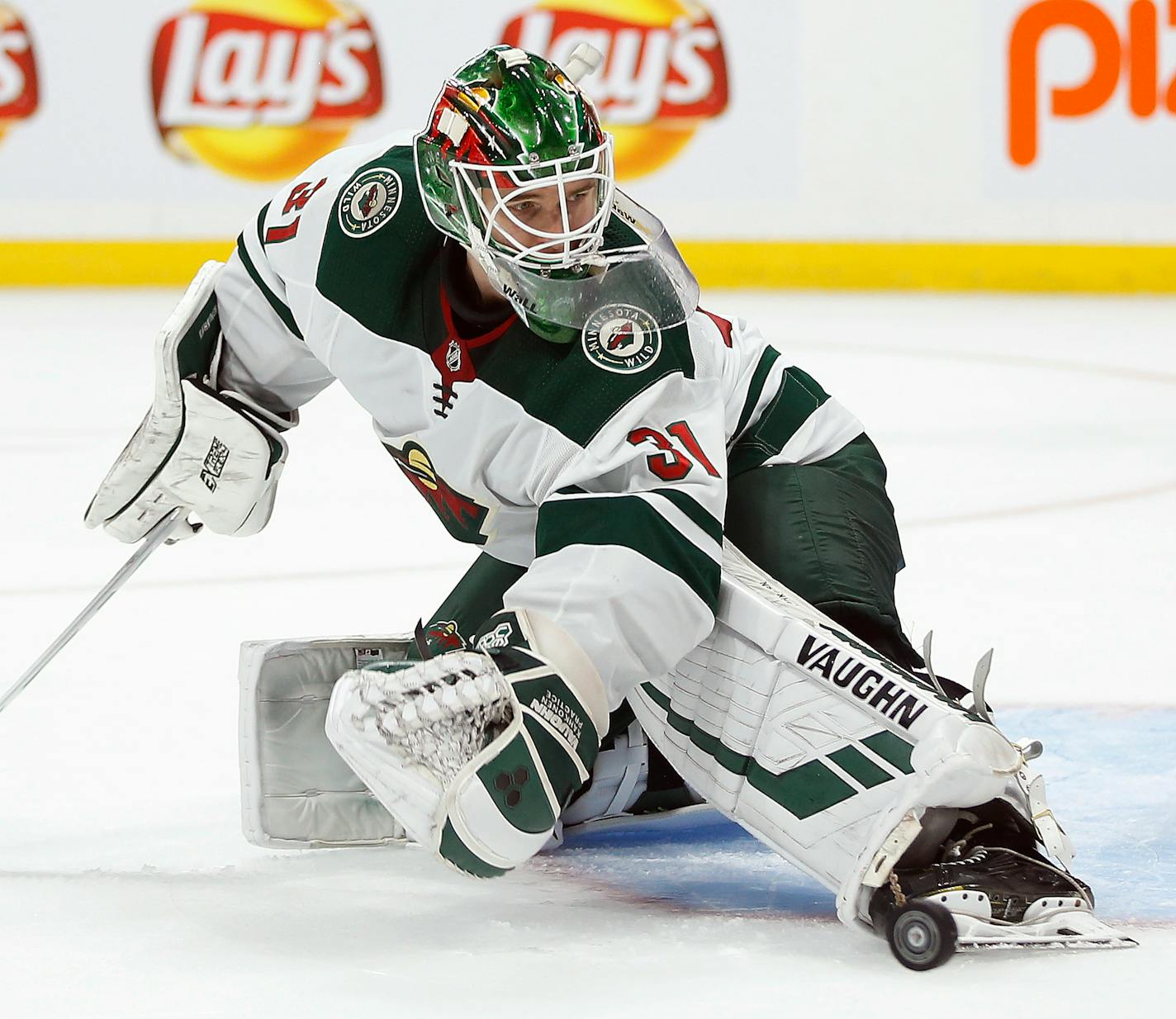 Wild goaltender Kaapo Kahkonen made a save against Winnipeg in a preseason game in September. He'll make his Wild and NHL debut against the Devils on Tuesday night.