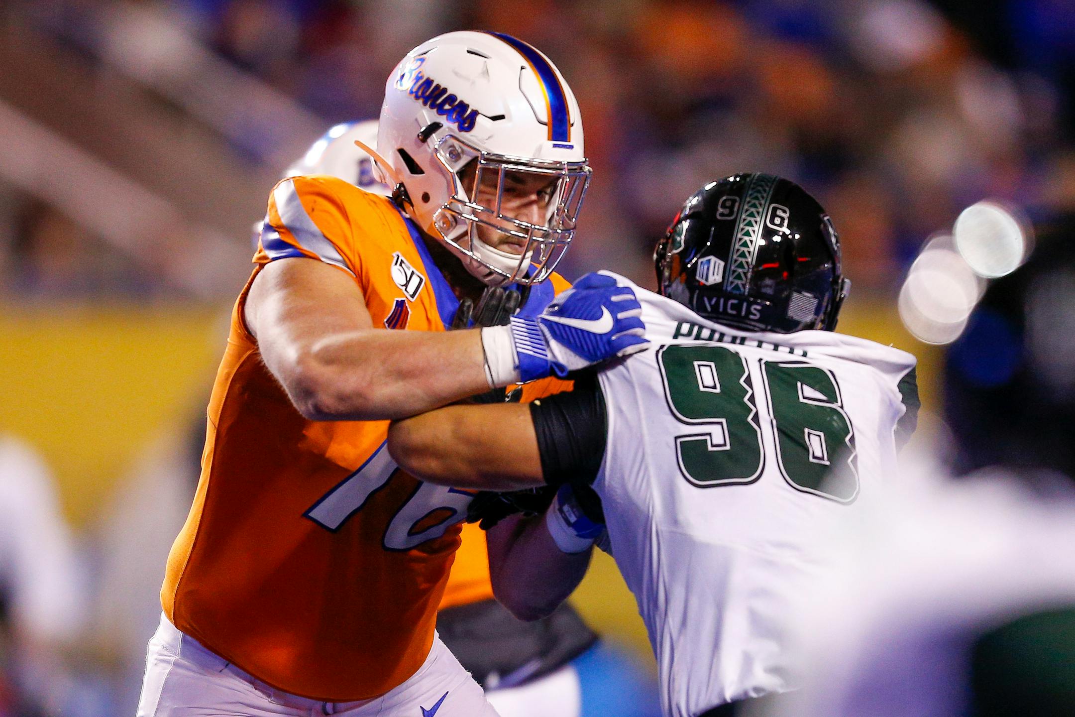 The Vikings' drafting of Boise State tackle Ezra Cleveland, left, in the second round could pay off in the long run more than other immediate, expensive fixes.