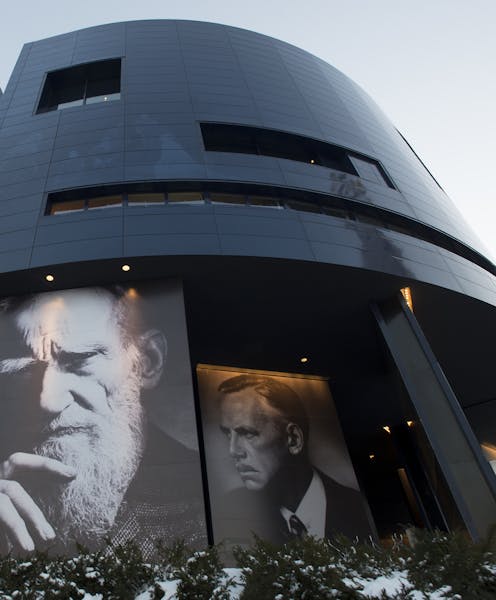 The north side of the Guthrie Theater, with the faces of George Bernard Shaw, left, and Eugene O'Neil, is pictured Wednesday night. ] (Aaron Lavinsky 