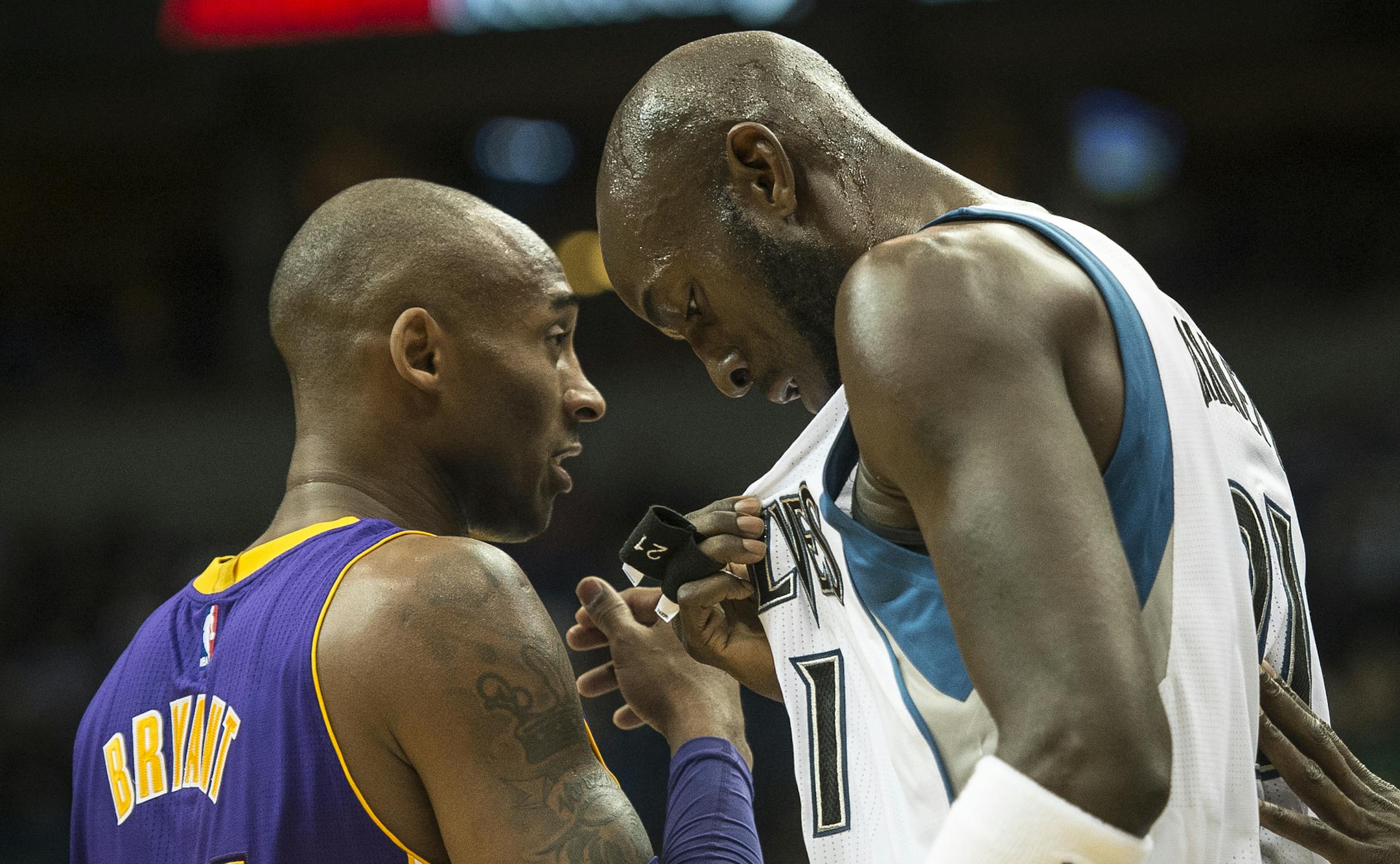 Los Angeles Lakers forward Kobe Bryant (24) and Minnesota Timberwolves forward Kevin Garnett (21) stood side by side during a break in first quarter action Wednesday night. ] (AARON LAVINSKY/STAR TRIBUNE) aaron.lavinsky@startribune.com The Minnesota Timberwolves played the Los Angeles Lakers on Wednesday, Dec. 9, 2015 at Target Center in Minneapolis, Minn. ORG XMIT: MIN1512092021431446