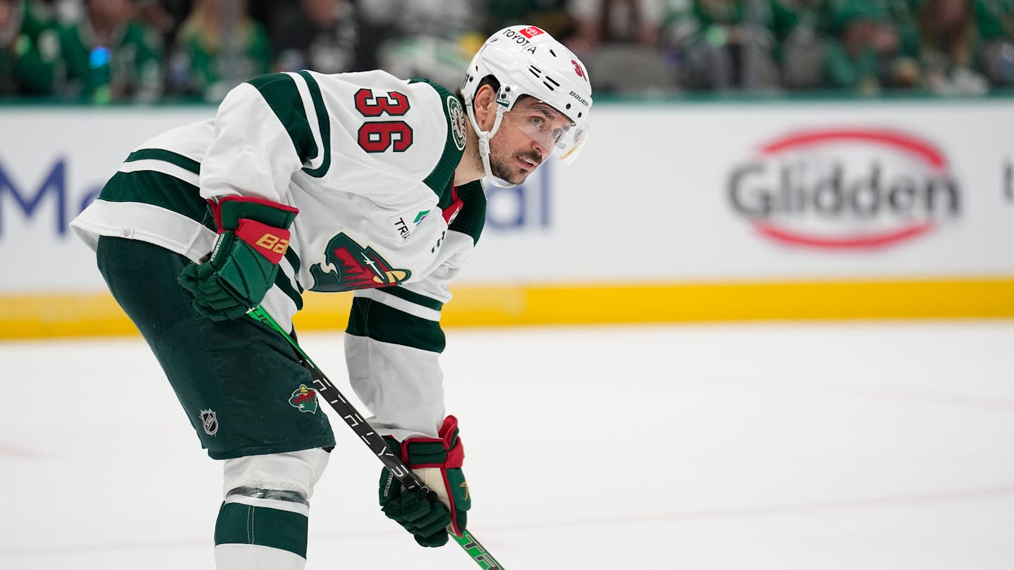 Minnesota Wild right wing Mats Zuccarello watches a face-off during Game 5 of an NHL hockey Stanley Cup first-round playoff series against the Dallas Stars, Tuesday, April 25, 2023, in Dallas. (AP Photo/Tony Gutierrez)