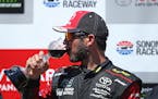 Martin Truex Jr. drank wine after winning a NASCAR Sprint Cup Series race Sunday in Sonoma, Calif.