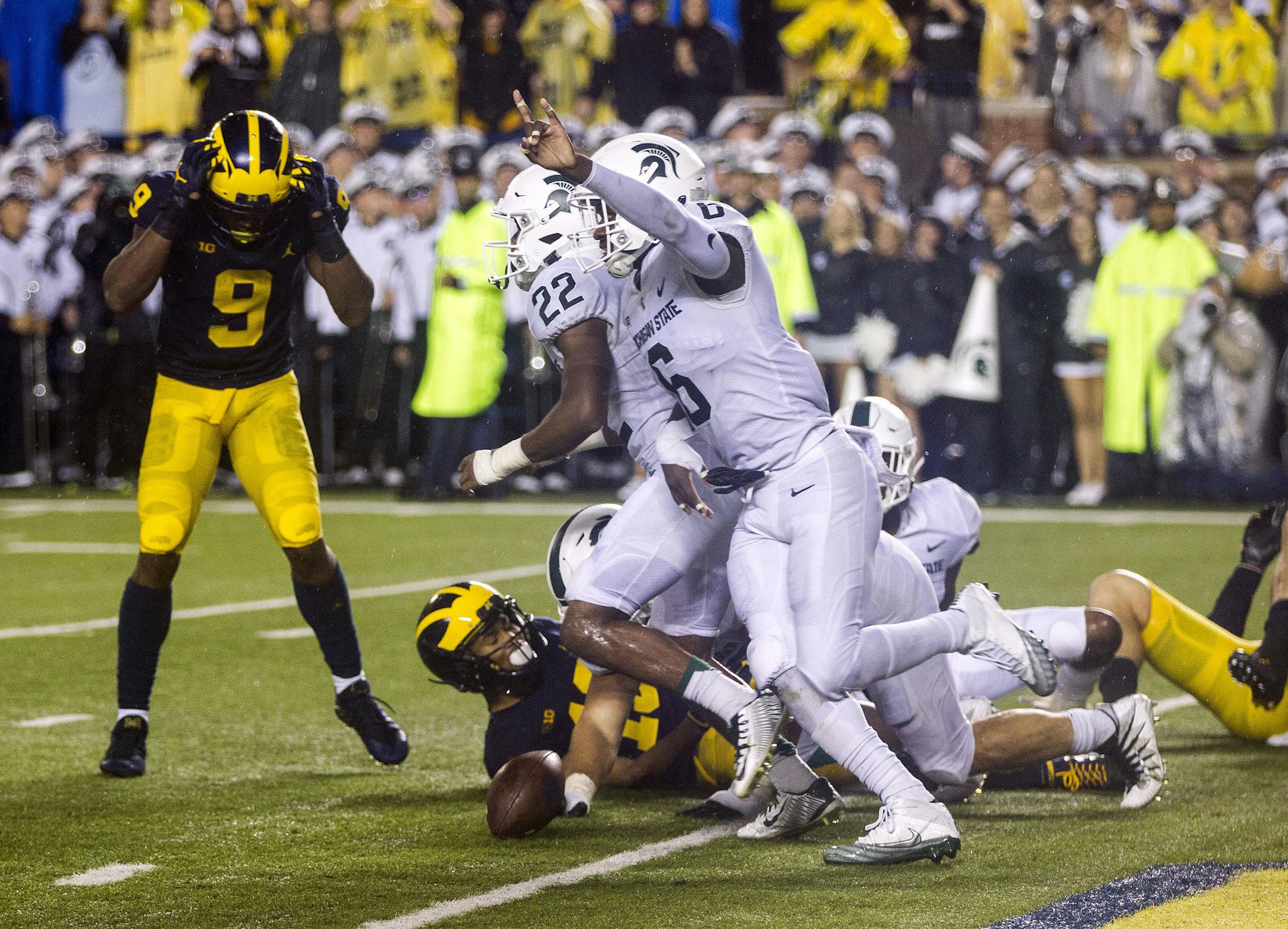 Michigan State safety David Dowell (6) celebrates after a Michigan pass-attempt was broken up in the end zone in the final seconds of an NCAA college football game in Ann Arbor, Mich., Saturday, Oct. 7, 2017. (AP Photo/Tony Ding)