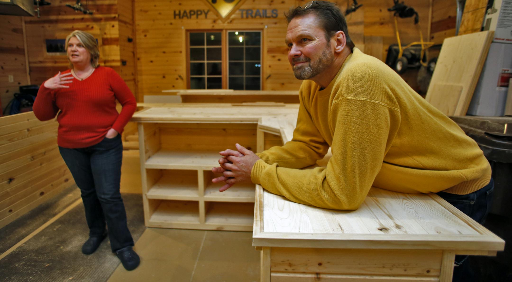 Kelly and Bob Rodenberg of Dayton are building wooden custom bars for consumer use in family rooms or personal man caves. They worked on the bars in their home garage. (MARLIN LEVISON/STARTRIBUNE(mlevison@startribune.com)