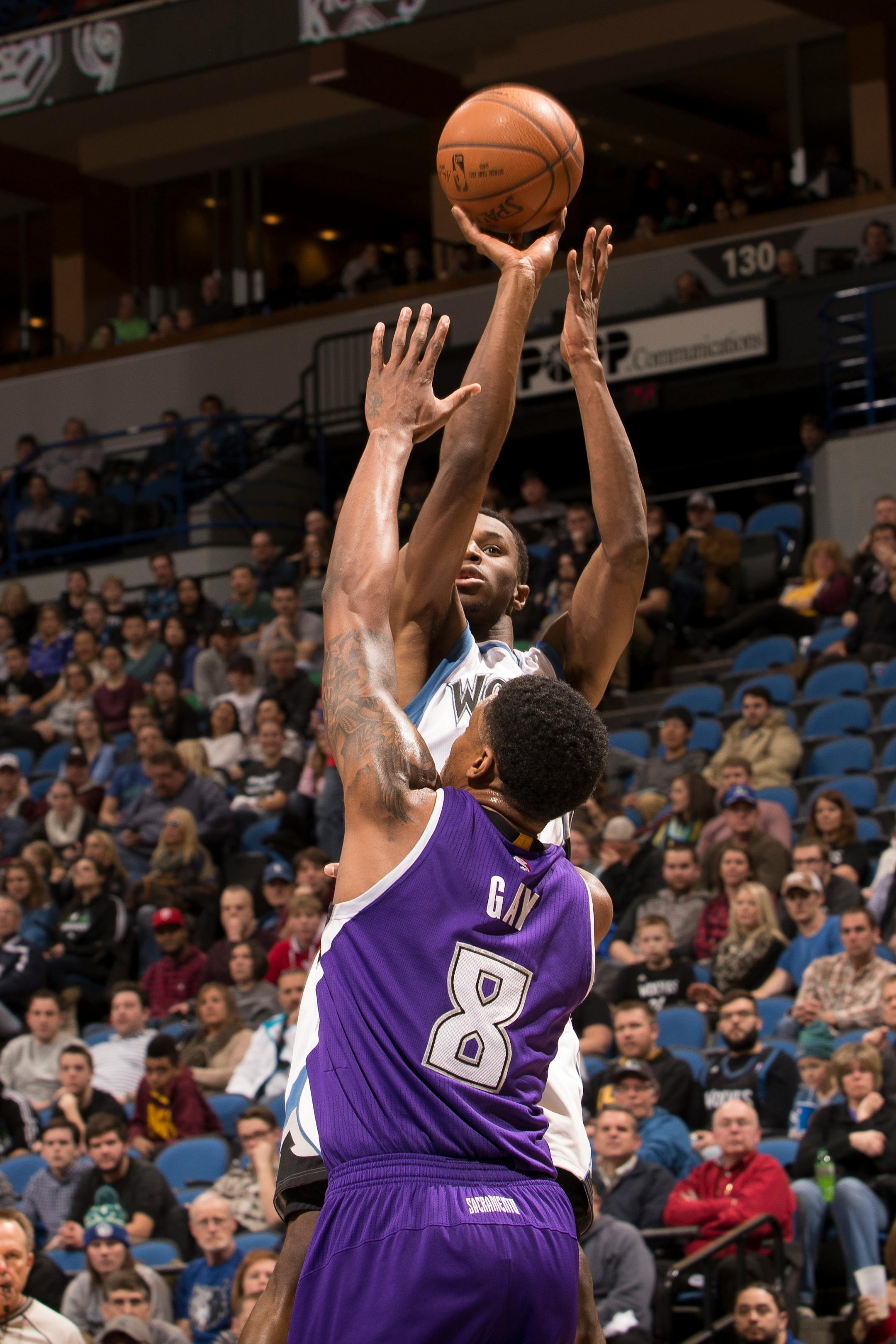 Minnesota Timberwolves forward Andrew Wiggins (22) hits a shot over Sacramento Kings forward Rudy Gay (8) during the second quarter.