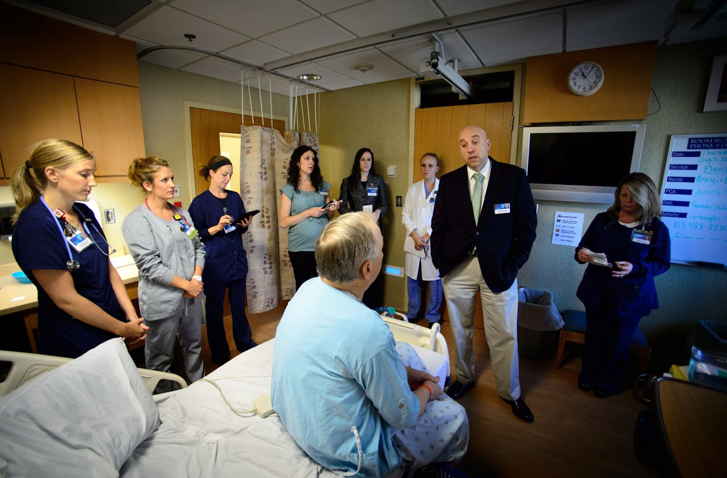 Dr. Robert Cima, who specializes in colon and rectal surgery and the patient care team checked on patient Dan Thomas. The Mayo model is for larger multi-disciplinary teams to focus on one patient at a time. Dr. Cima is the medical director of surgical outcomes and chair of surgical quality. July 2, 2014 ] GLEN STUBBE * gstubbe@startribune.com