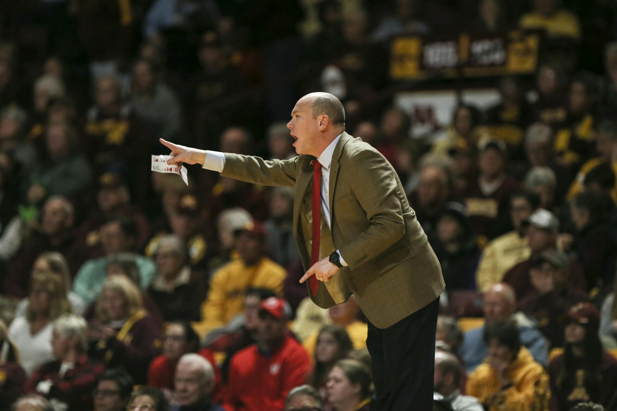 Badgers head coach Jonathan Tsipis in the first half.