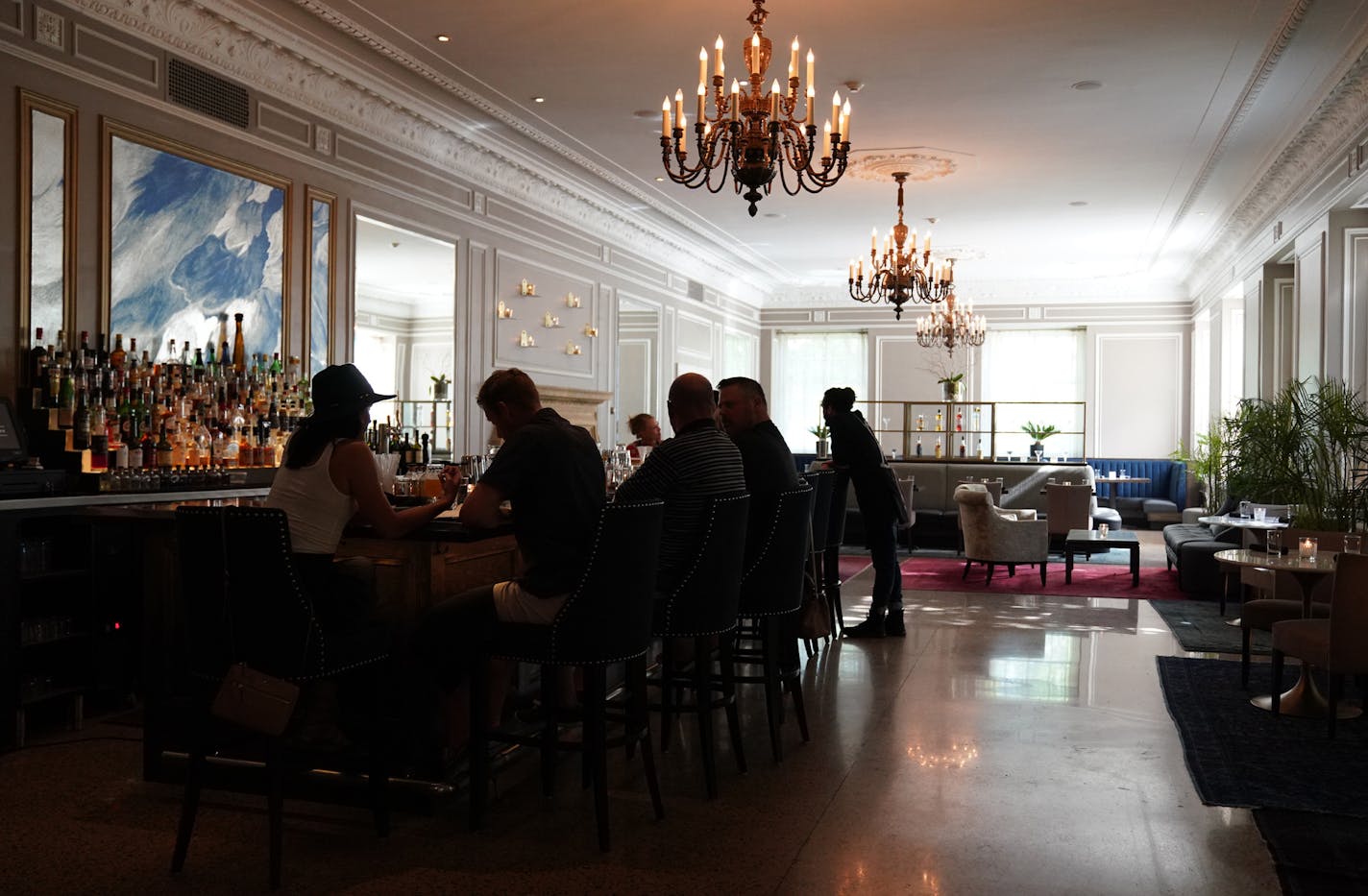 The lounge area of P.S. features chandeliers and is a perfect backdrop for date night.