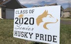 Signs are appearing in yards to note that a 2020 high school graduate is in residence. This one was in Andover.