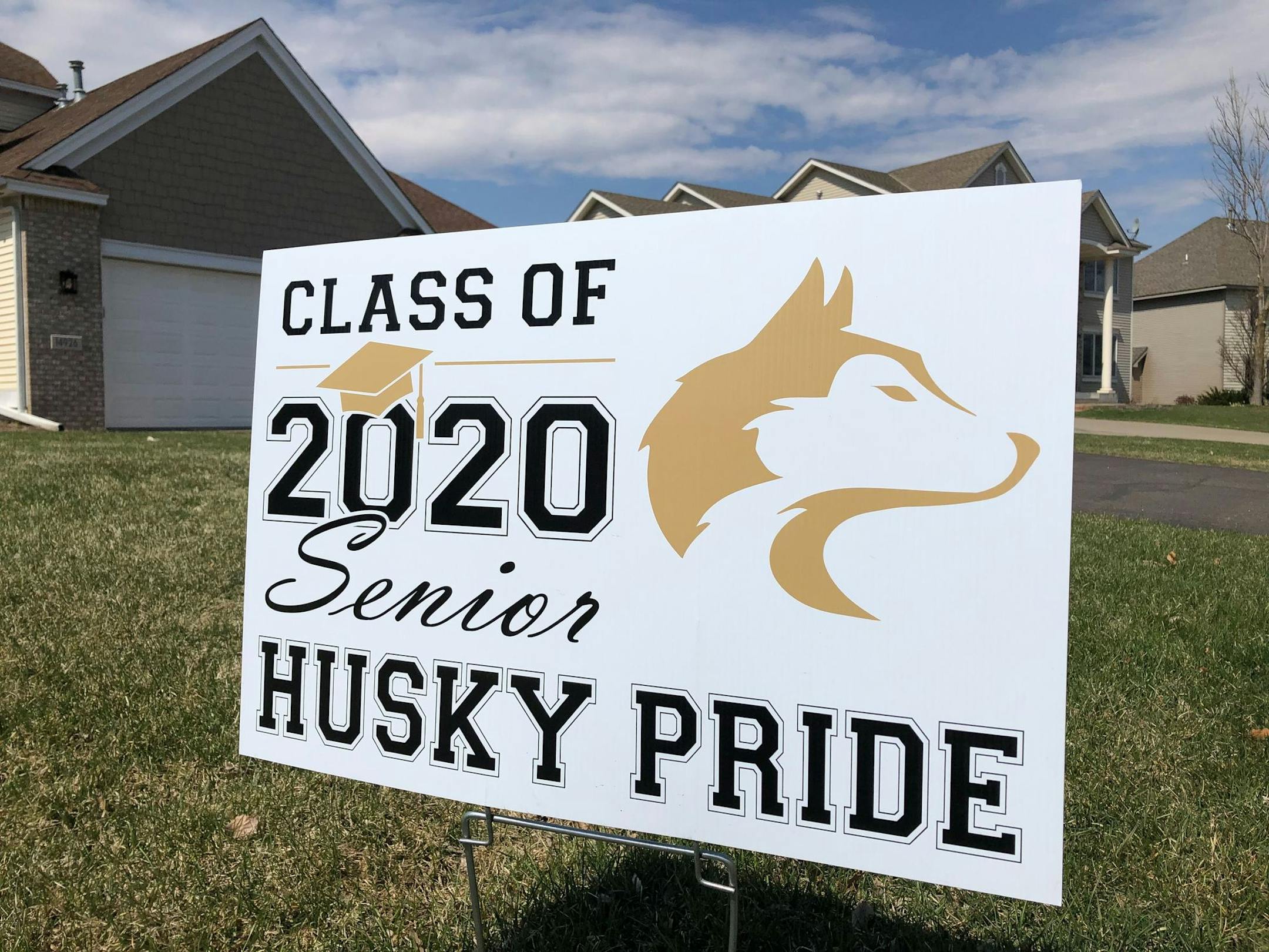 Signs are appearing in yards to note that a 2020 high school graduate is in residence. This one was in Andover.
