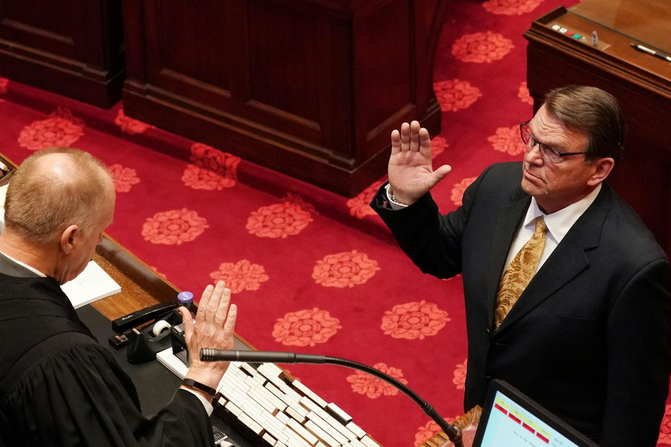 Incoming Senate Secretary Cal Ludeman took the oath of office in the Senate Chamber on the first day of the legislative session.