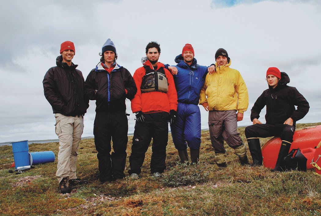 Alex Messenger, left, posed for a self-portrait with members of his party during their trek in 2005.