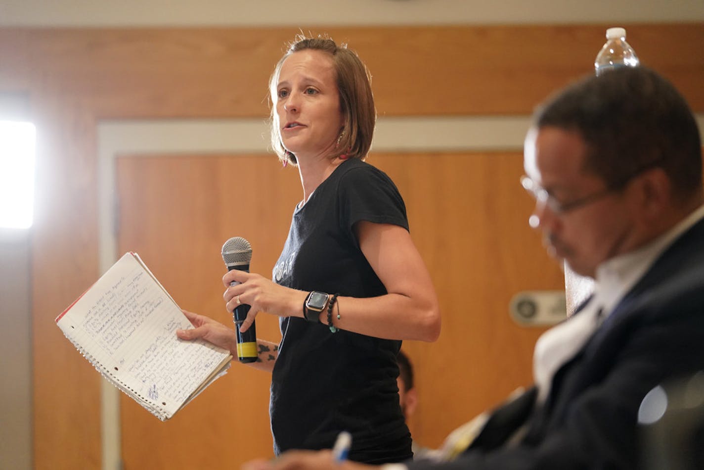 ROAR organizer Jenna Cruz introduced Minnesota Attorney General Keith Ellison at Tuesday night's meeting in Chaska.