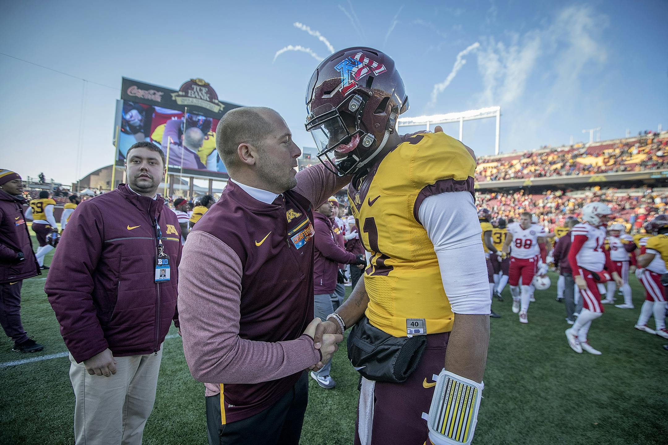 Minnesota's Head Coach P. J. Fleck congratulated quarterback Demry Croft for his performance as they defeated Nebraska 54-21, Saturday, November 11, 2017 at TCF Bank Stadium in Minneapolis, MN.