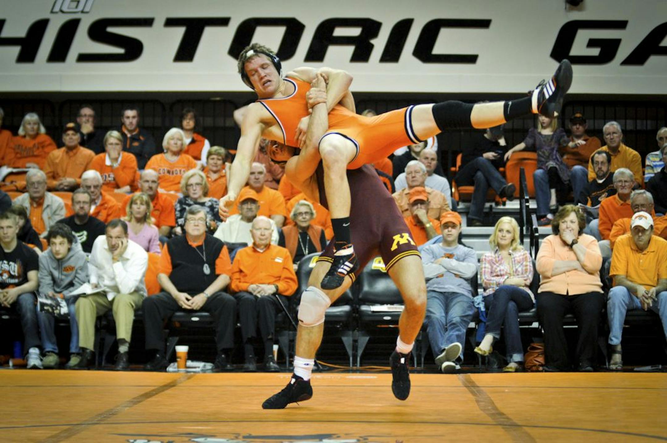 The Gophers' Sonny Yohn, who won both of his 197-pound matches on Sunday, slammed down Oklahoma State's Blake Rosholt in the National Duals championship match.
