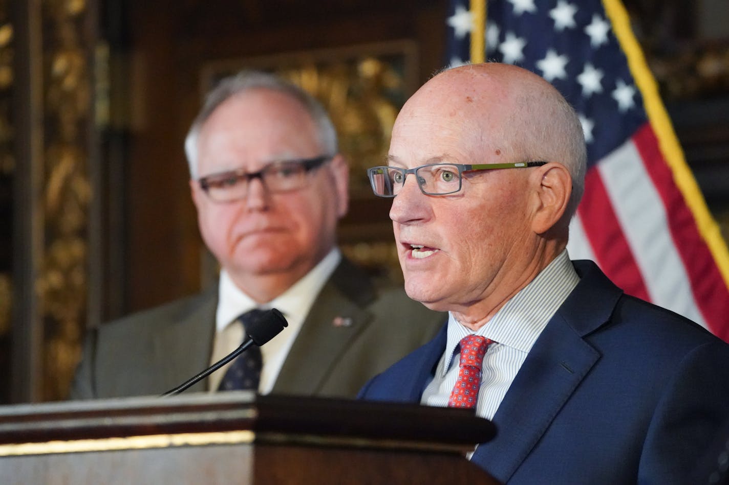 Gov. Tim Walz, left, and Budget Commissioner Myron Frans presented a scaled-back supplemental state budget on March 12.