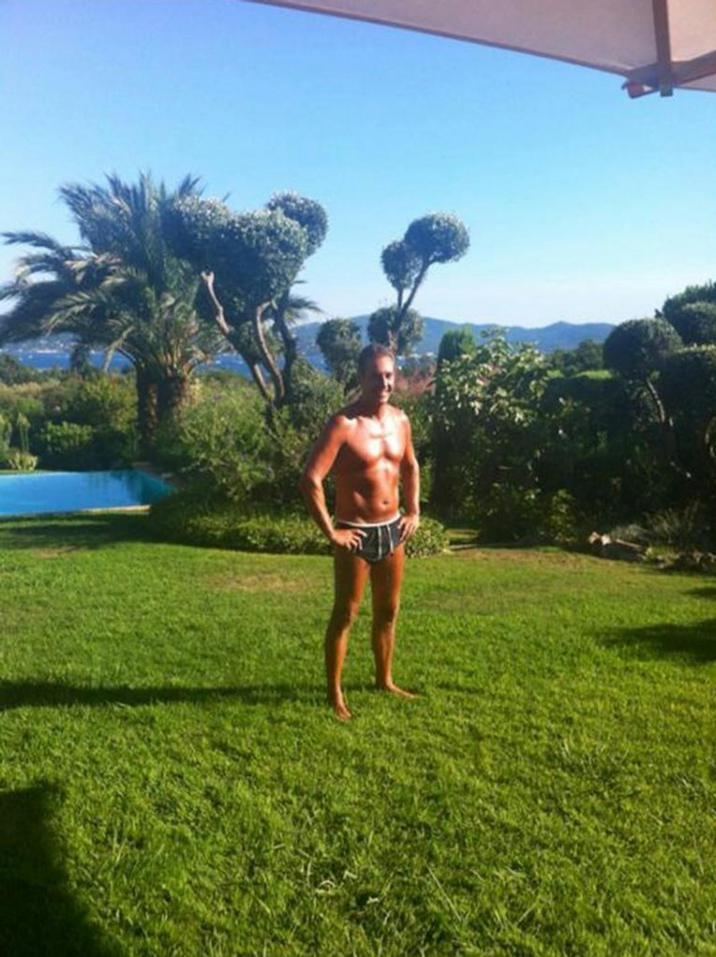 In this undated photo provided by the Austrian Freedom Party (FPOE) via Facebook, the party's head Heinz-Christian Strache poses in his bathing suit at an unknown location.