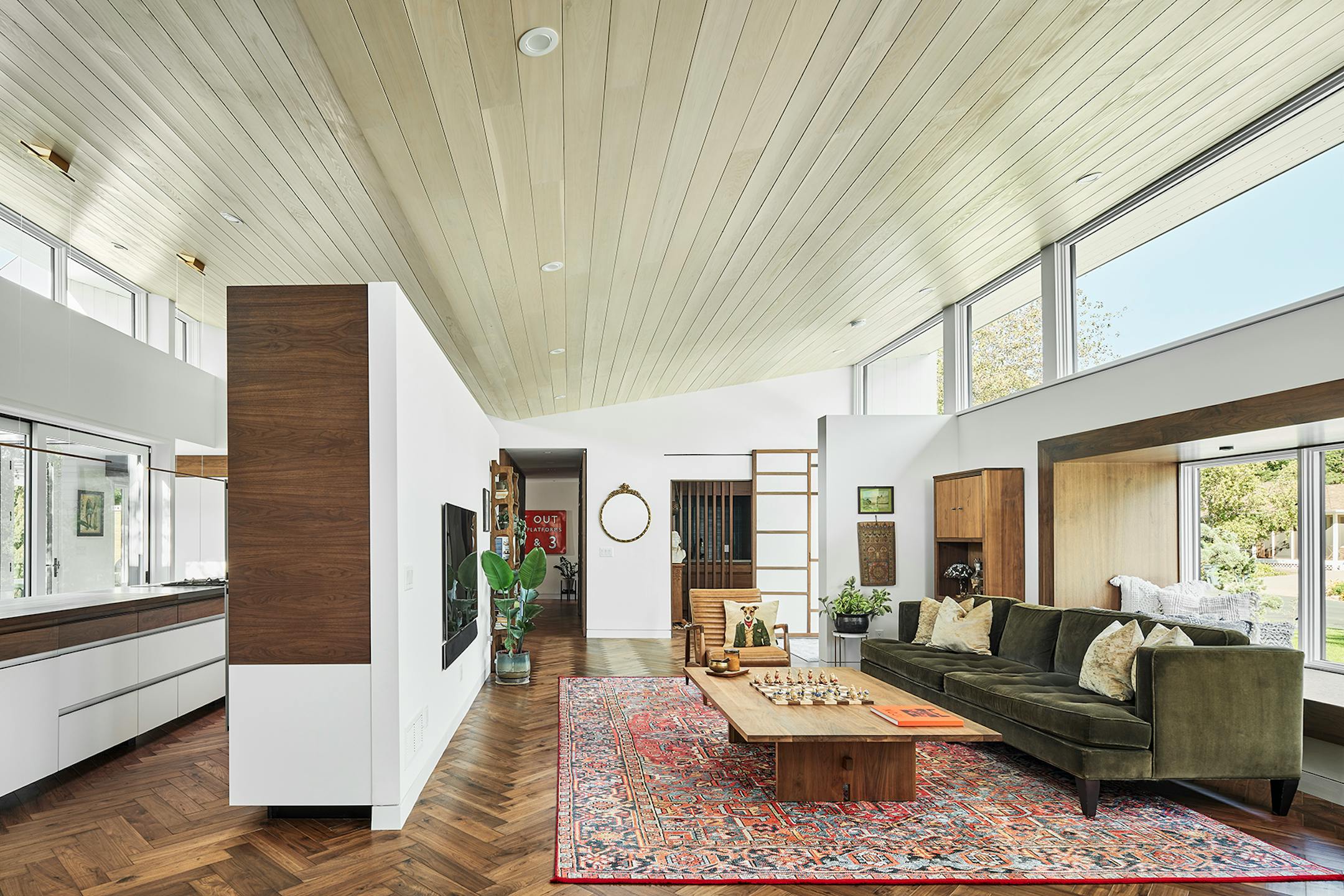 After a fire forced a remodel of a St. Louis Park home, a family hoped for a footprint similar to their original single-story ranch-style house. At the same time, they were game for introducing new, bold and unique materials and design features such as soaring rooflines and transom windows that allow light to come in and display the family's vast plant collection like never before.