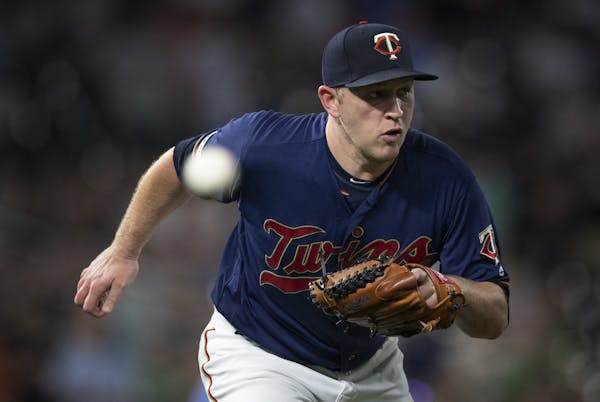 Minnesota Twins relief pitcher Tyler Duffey (21) runs to first base to the get the last out at Target Field Tuesday June 25 2019 in Minneapolis, MN.] 
