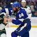 Lightning defenseman Zach Bogosian and the Wild’s Ryan Hartman fought during the first period Sunday after Hartman came out of the penalty box after