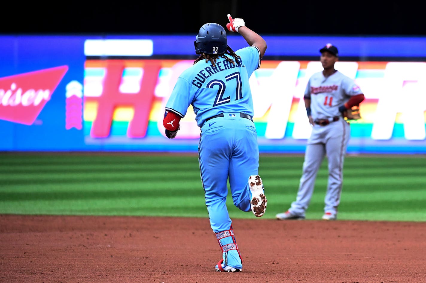 Toronto Blue Jays' Vladimir Guerrero Jr (27) runs the bases after hitting a solo home run against the Minnesota Twins during the third inning of a baseball game Friday, June 3, 2022, in Toronto. (Jon Blacker/The Canadian Press via AP)