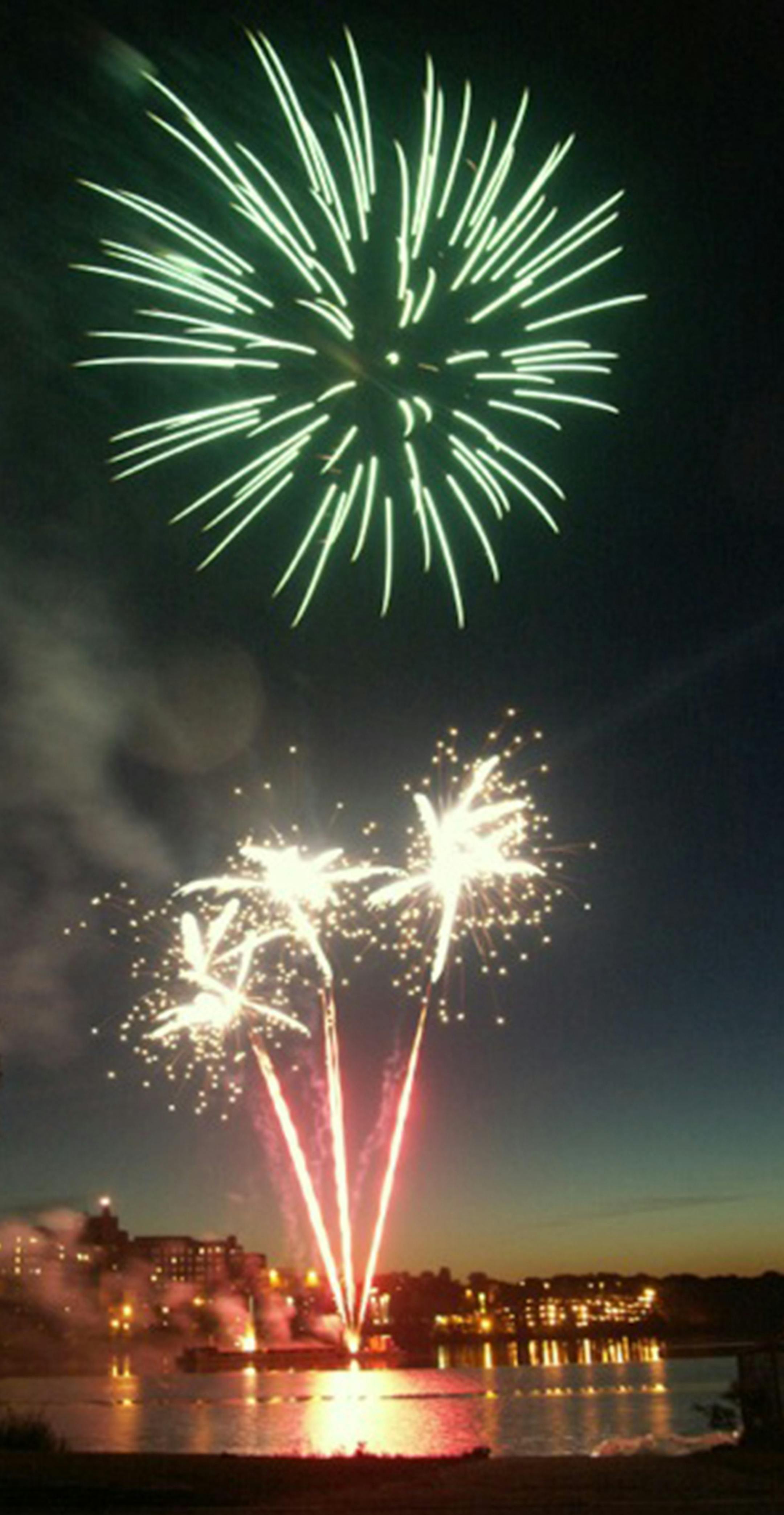 St. Cloud, MN July 04 fireworks display -'provided by St. Cloud Fireworks Committee'.