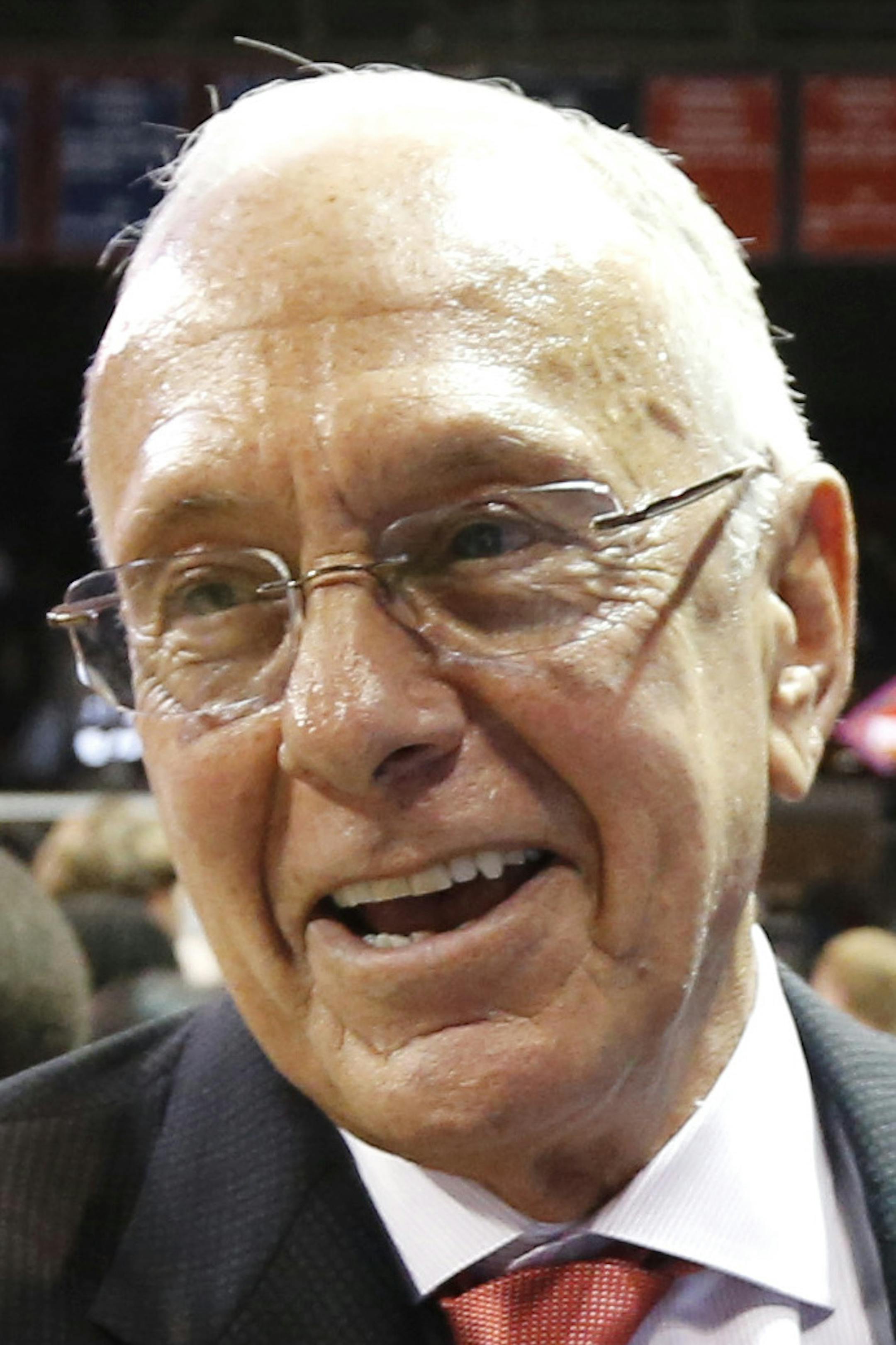 SMU head coach Larry Brown celebrates with fans after an NCAA college basketball game against California in the quarterfinals of the NIT Wednesday, March 26, 2014, in Dallas. SMU won 67-65. (AP Photo/Sharon Ellman) ORG XMIT: OTKSE126