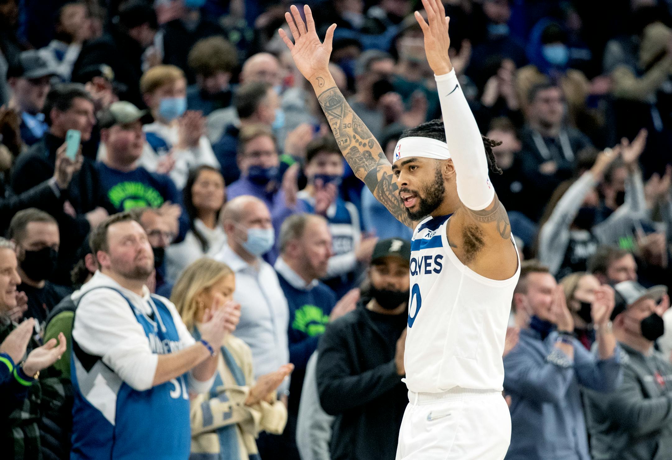 D'Angelo Russell (0) of the Minnesota Timberwolves gets the crowd going in overtime Tuesday, Feb. 15, at Target Center in Minneapolis, Minn. ] CARLOS GONZALEZ • cgonzalez@startribune.com