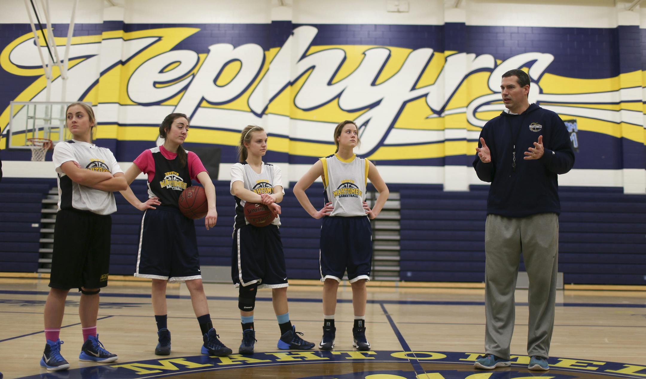 Mahtomedi coach Dan Greene talked to his players before practice Monday. Greene said he’s seeing a surge in interest in girls’ basketball at Mahtomedi. (Jeff Wheeler, Star Tribune)