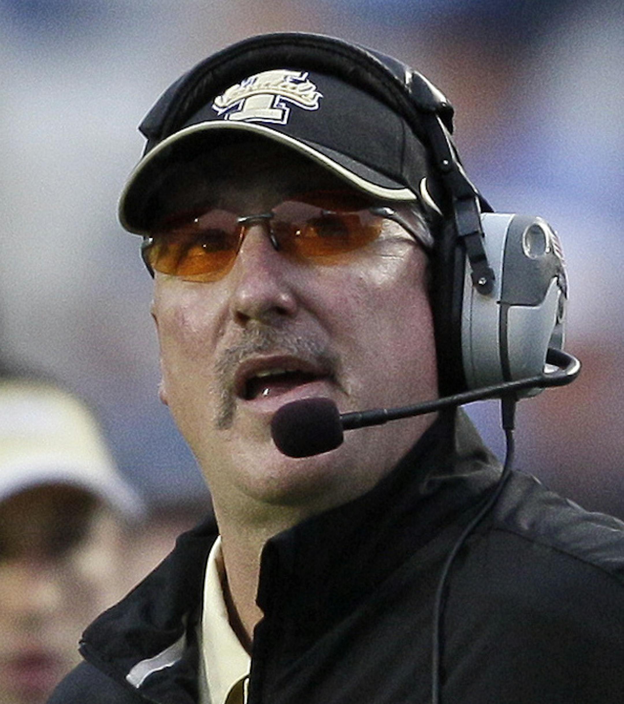 Idaho coach Robb Akey looks toward the scoreboard during the first half of an NCAA college football game against North Carolina in Chapel Hill, N.C., Saturday, Sept. 29, 2012. North Carolina won 66-0. (AP Photo/Gerry Broome) ORG XMIT: NCGB115