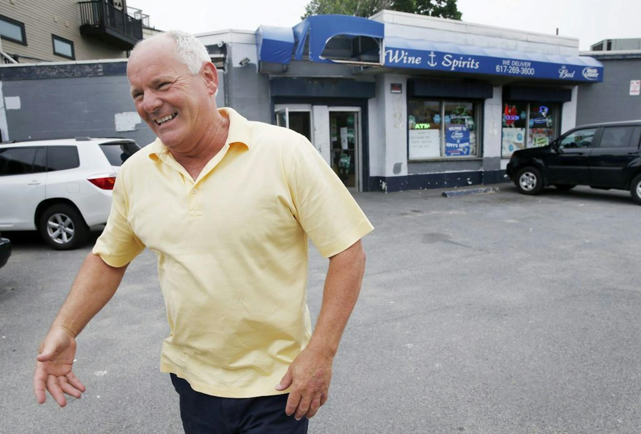 File -- In this Thursday, June 6, 2013, file photo Stephen Rakes smiles after greeting an acquaintance outside the liquor store he once owned in the South Boston neighborhood of Boston. Authorities say Rakes, who was on the witness list for the racketeering trial of reputed mobster James "Whitey" Bulger, has died. The Middlesex District Attorney�s Office says Stephen Rakes was found dead Wednesday, July 17, 2013 about 1:30 p.m. in Lincoln, Mass., with no obvious signs of trauma to his body.