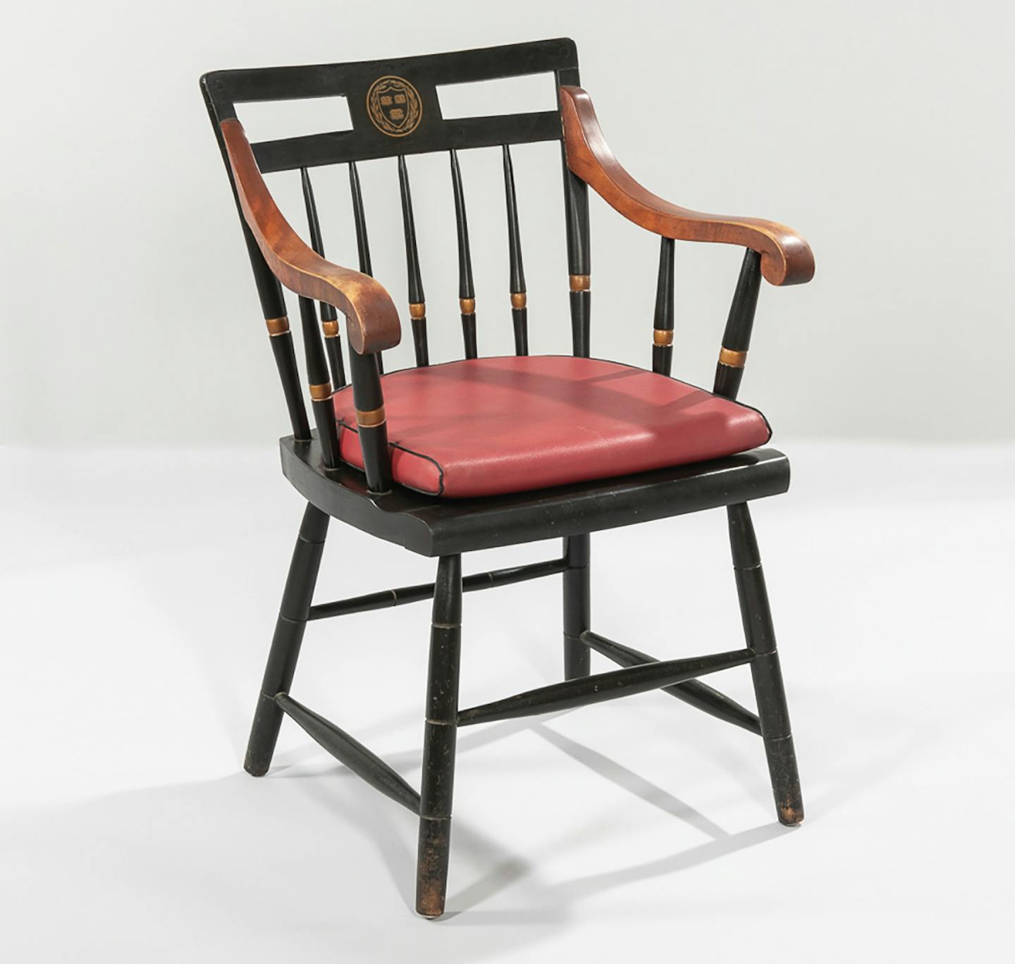 This midcentury Windsor style chair features the crest and colors of Harvard University. It sold for $438, more than twice its estimate, at a Bonhams Skinner auction.