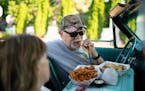 Ralph Stinger bit into his first French fry while dining in his '64 Ford Galaxie 500 with his wife, Bobbi, at Clays Galaxy Drive In.