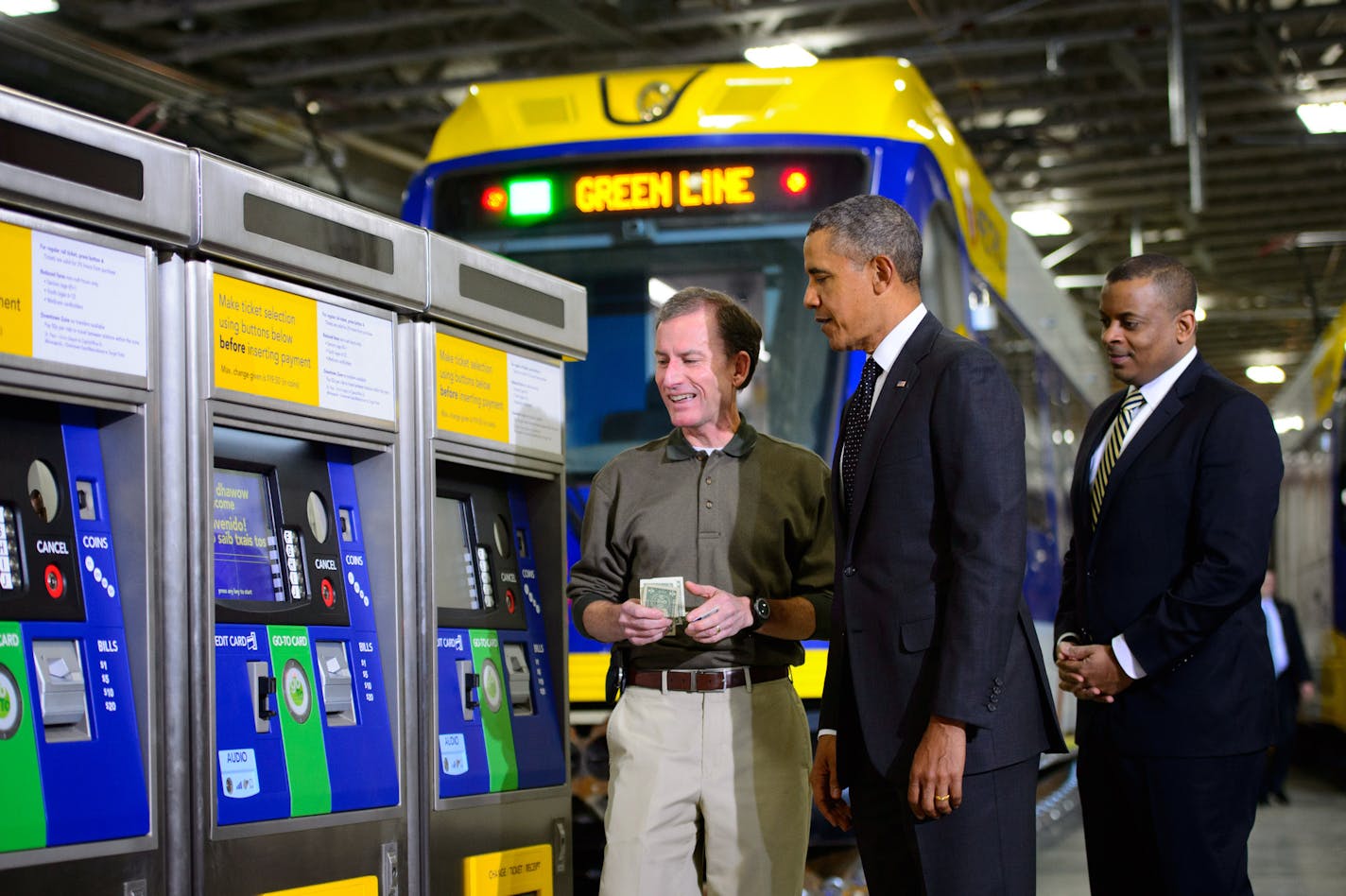 Mark Fuhrmann, deputy general manager of transportation for Metro Transit, pictured in 2014 with President Barack Obama and then-Transportation Secretary Anthony Fox, is retiring Aug. 14.