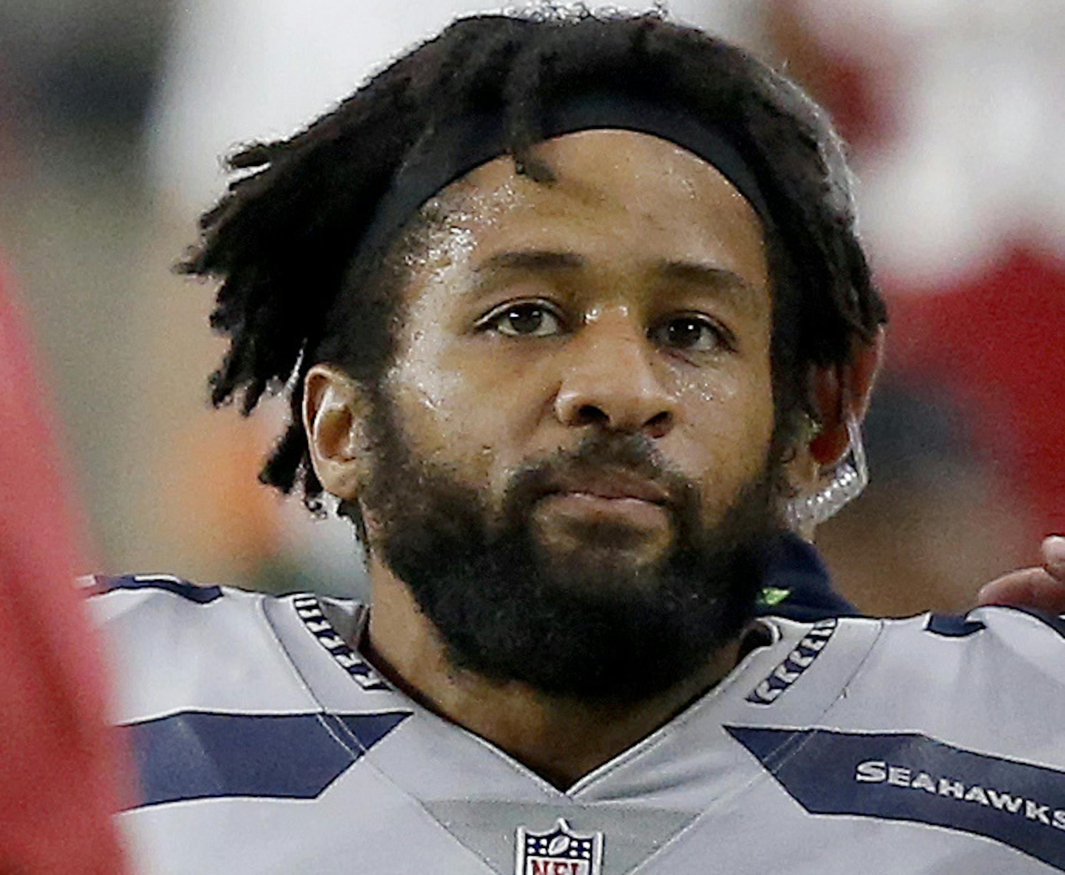 FILE - In this Sept. 30, 2018, file photo, Seattle Seahawks defensive back Earl Thomas (29) is greeted by Arizona Cardinals players as he leaves the field after breaking his leg during the second half of an NFL football game in Glendale, Ariz. The Seahawks won 20-17. The Seahawks face the Los Angeles Rams and running back Todd Gurley this week. (AP Photo/Ross D. Franklin, File) ORG XMIT: NY201