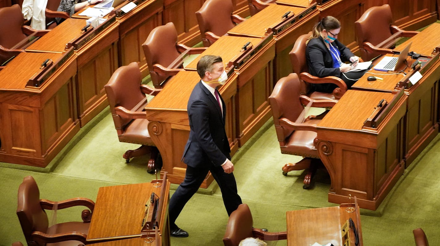 House Majority Leader Ryan Winkler, DFL-Golden Valley walked into the House Chamber wearing a mask.