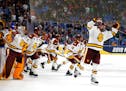 Minnesota Duluth players spilled onto the ice after the Bulldogs defeated Massachusetts 3-0 to win the 2019 NCAA men's hockey championship in Buffalo,