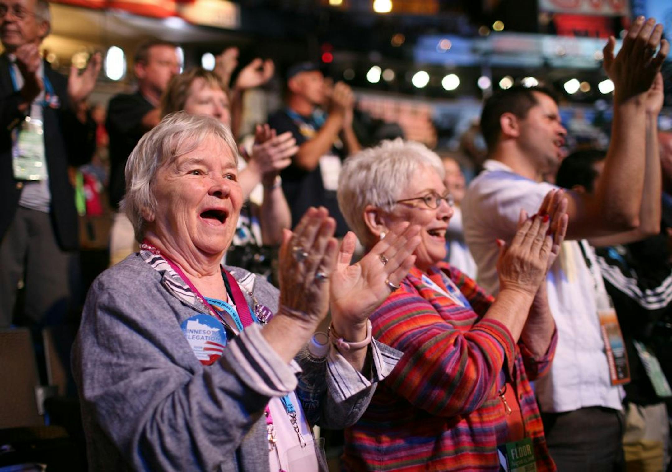 Minnesota delegates, including Jackie Stevenson, left, of Minnetonka, gave Sen. Amy Klobuchar a rousing welcome as she was introduced to speak to the convention early Monday evening.