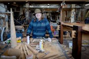 Woodworker Tom Guelcher shares how he found a bottle of whiskey that he had hidden many years ago in a porch in Minneapolis, Minn., on Friday, Dec. 1,