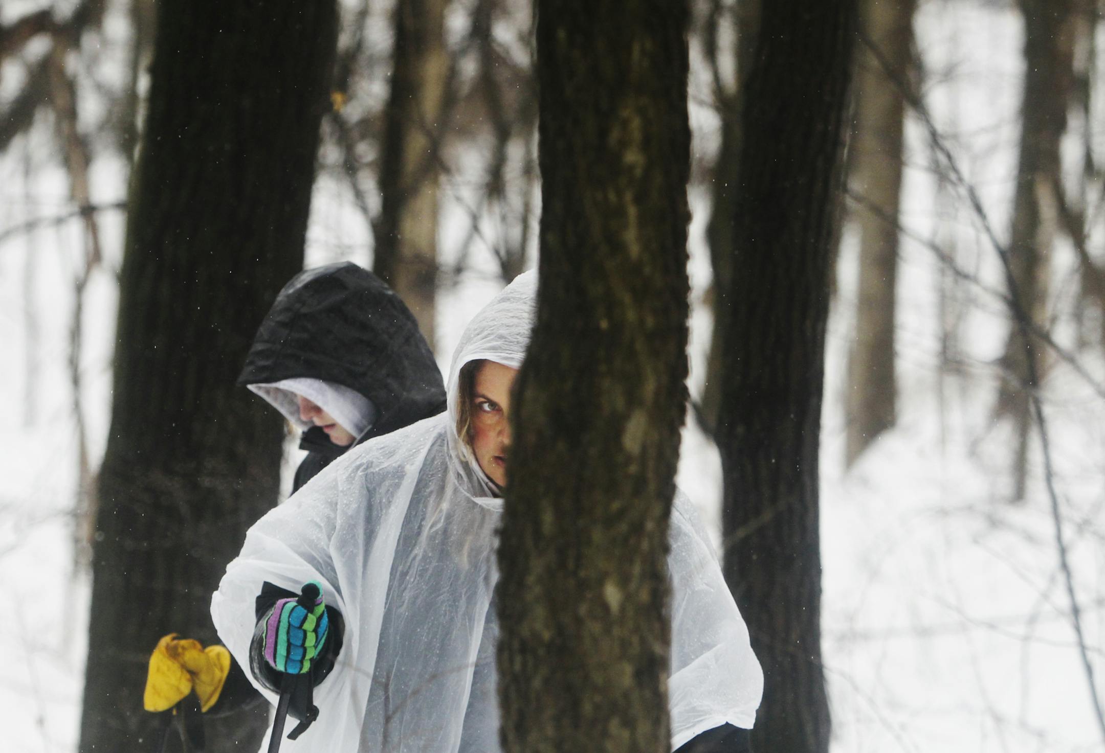 Jen McCutcheon of Lakeville, front, and her daughter Kayla, 16, searched a hill in Spring Lake Reserve, along the Mississippi River, for the body of Kira Trevino Saturday, March 9, 2013 in Rosemount, MN. McCutcheon said she and her daughter just hoped to "help the family find her."] (DAVID JOLES/STARTRIBUNE) djoles@startribune.com Volunteers searched the Spring Lake Reserve Saturday, March 9, 2013, in Rosemount, near the Mississippi River for the body of Kira Trevino, the St. Paul woman who went